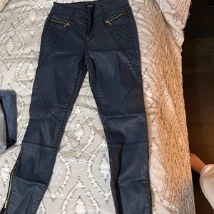 NWOT Navy leather jeans with gold zipper detail